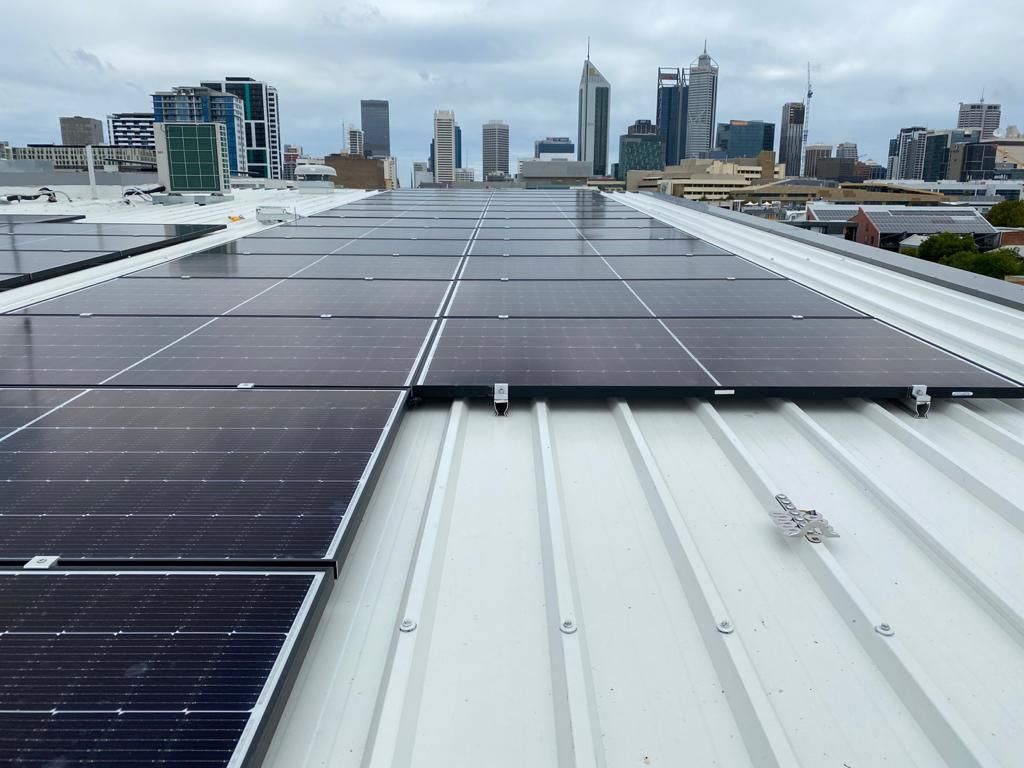 Perth Solar Direct installation team on a Perth rooftop
