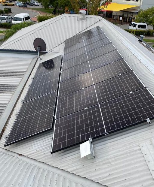 A roof with a lot of solar panels on it